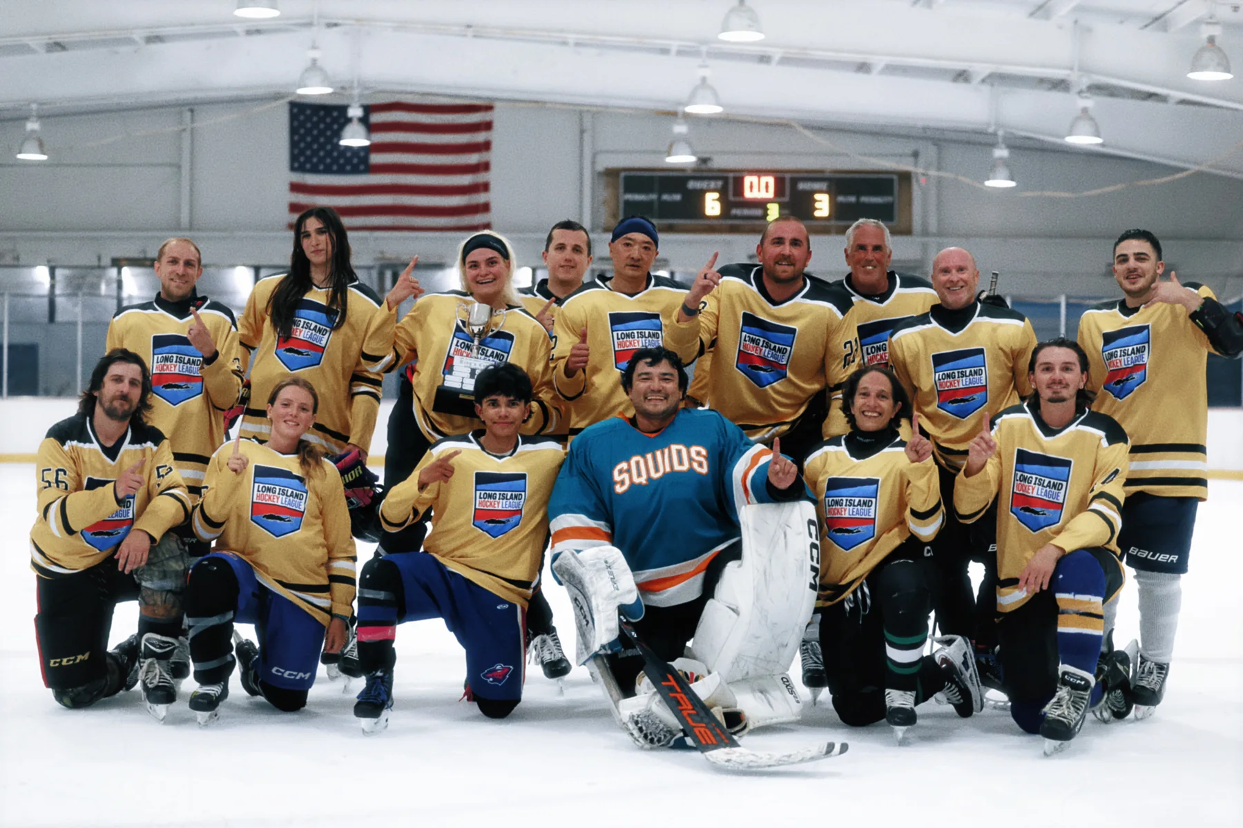 Golden Company celebrating together with the King’s Cup at Dix Hills.